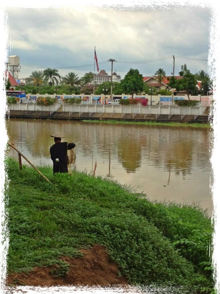 Fishing with cast net in Chiang Mai Pint River